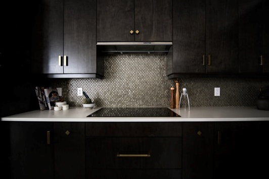 Black kitchen that reflects the most popular kitchen interior designs in Florida in 2022